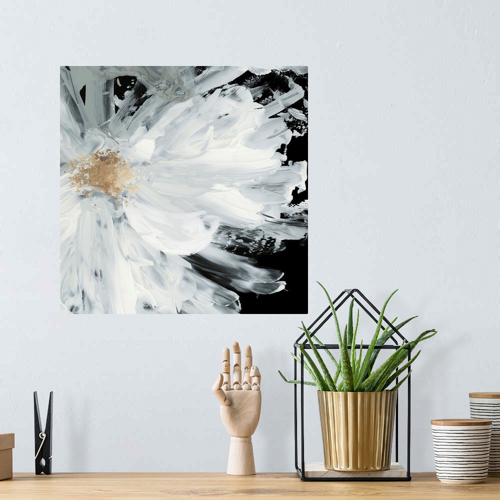 A bohemian room featuring Decorative artwork with a large white peony on a dark black background.
