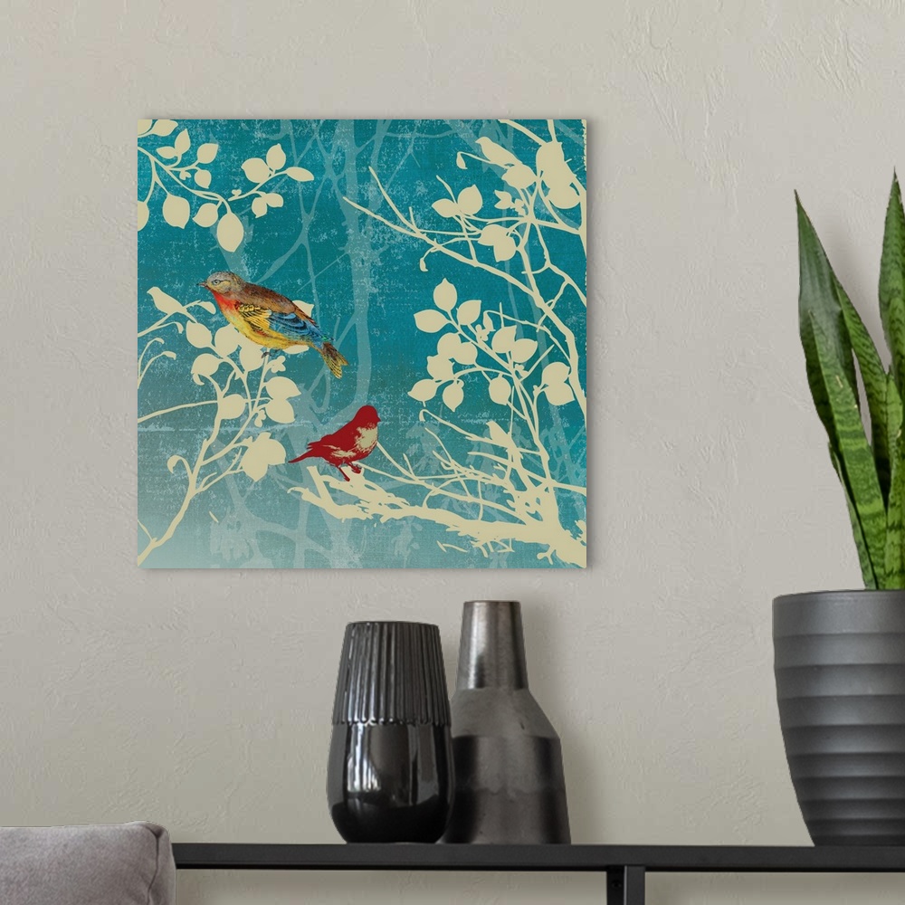 A modern room featuring Contemporary home decor art of  two birds perched on a silhouetted branch against a faded blue ba...