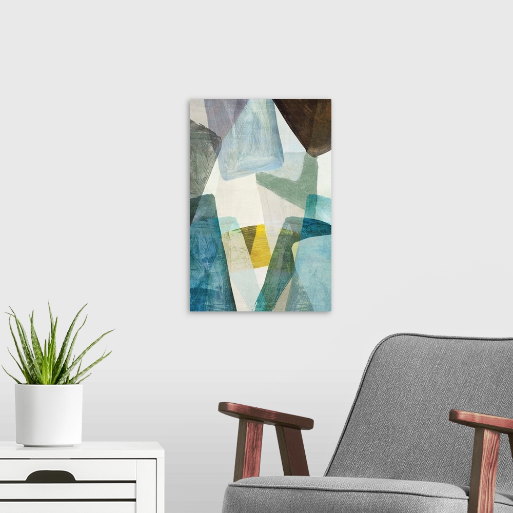 A modern room featuring Abstract artwork of overlapping shapes in blue and yellow tones.