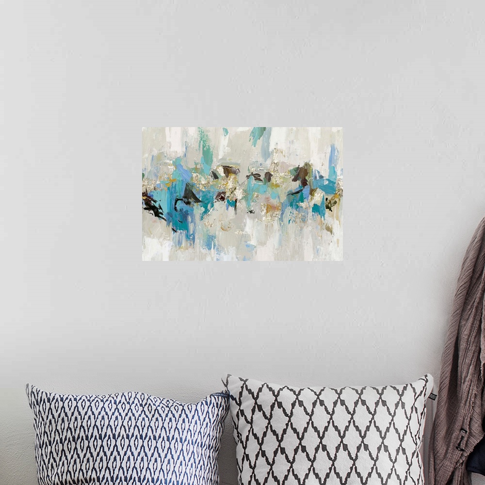 A bohemian room featuring Large abstract artwork made with shades of blue, gray, brown, and gold.