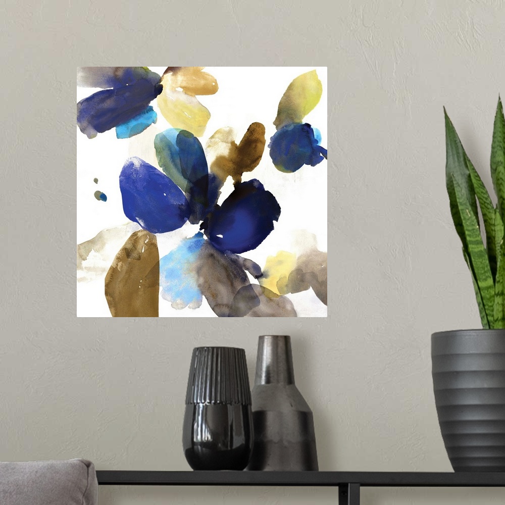 A modern room featuring Abstract watercolor artwork of organic blue and gold shapes on cream.