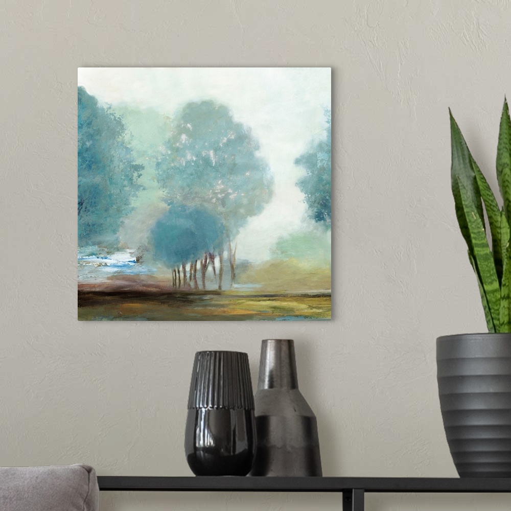 A modern room featuring Contemporary painting of a misty grove of trees in the countryside.