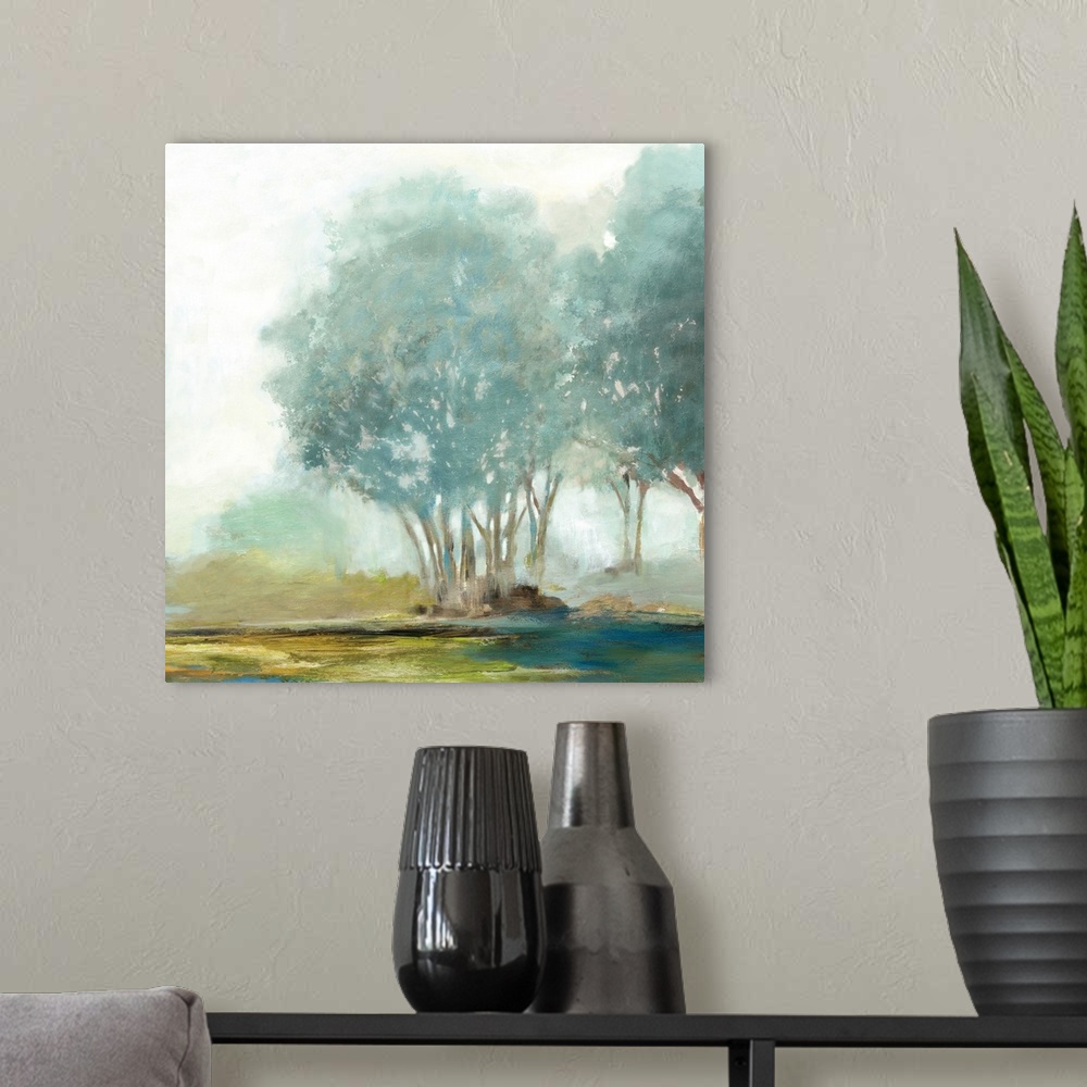A modern room featuring Contemporary painting of a misty grove of trees in the countryside.