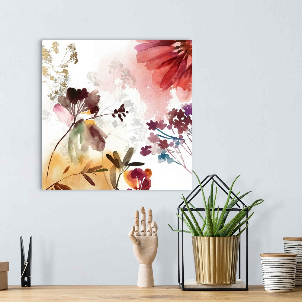 A bohemian room featuring Watercolor artwork of flowers in bloom in soft shades.