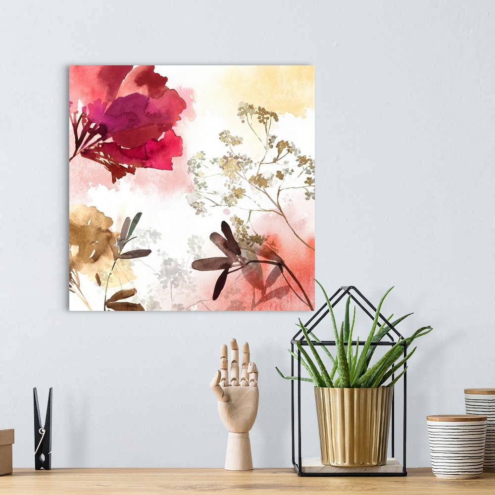 A bohemian room featuring Watercolor artwork of flowers in bloom in soft shades.