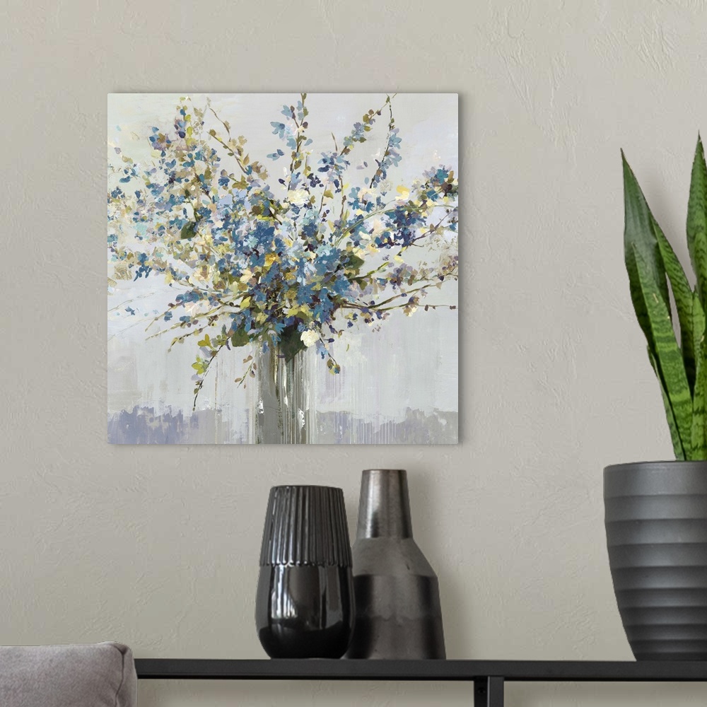 A modern room featuring Contemporary artwork of a vase full of blue and white flowers.