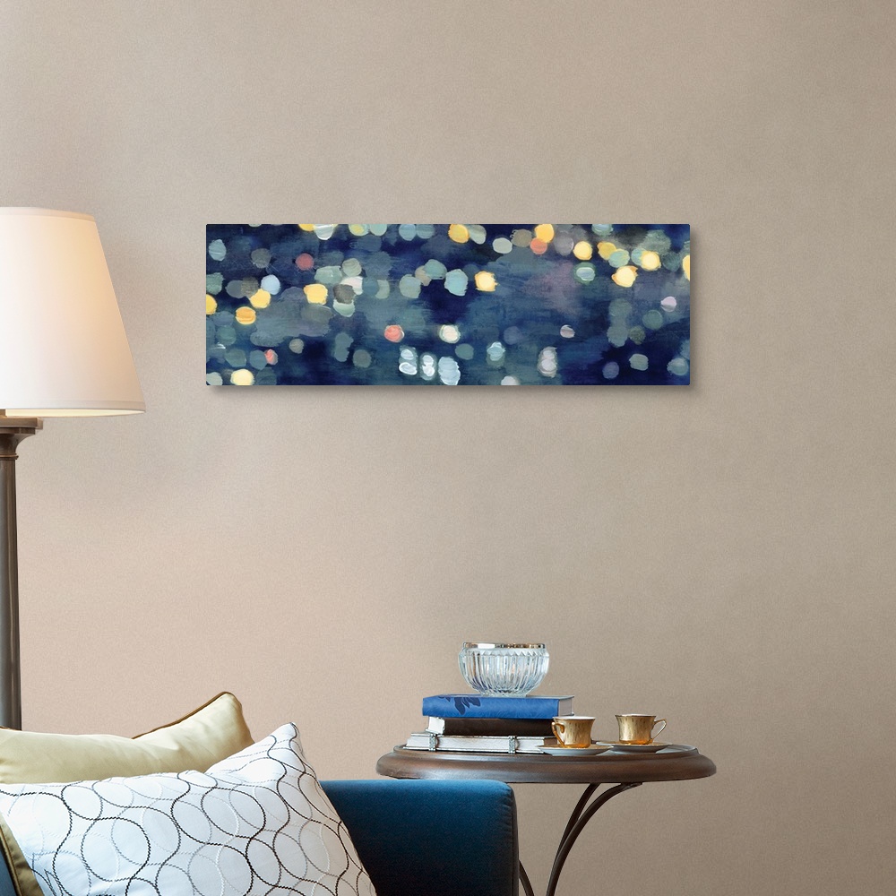 A traditional room featuring Abstract artwork in dark blue with gold and yellow shapes resembling blurred lights at night.