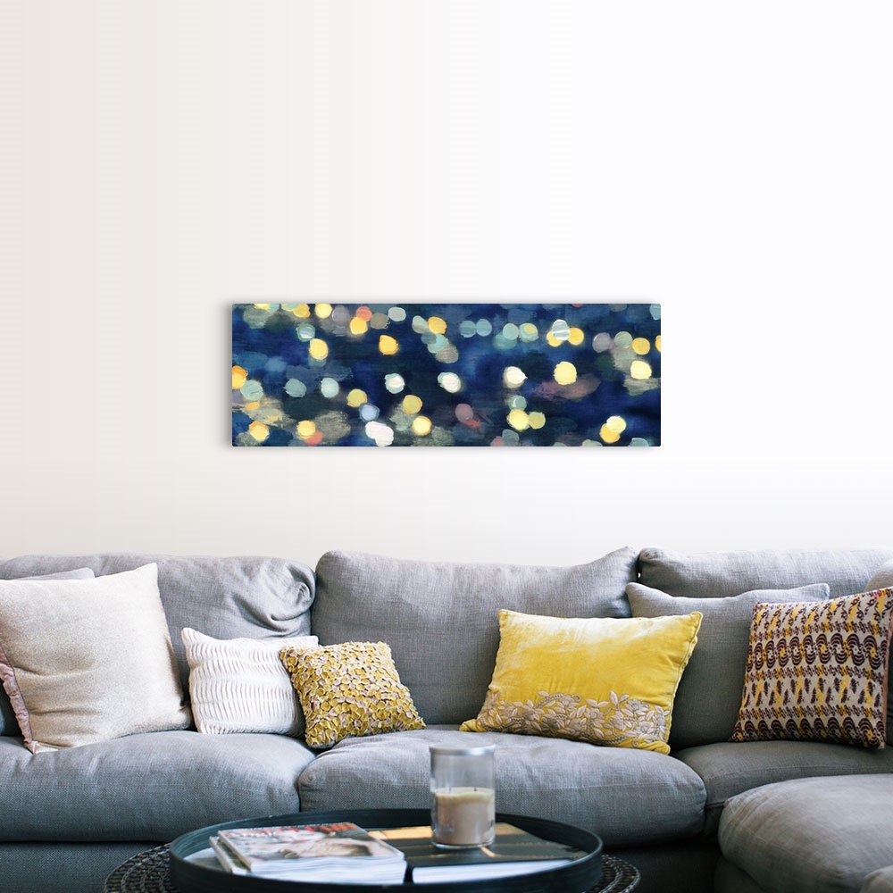 A farmhouse room featuring Abstract artwork in dark blue with gold and yellow shapes resembling blurred lights at night.