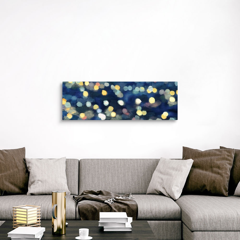 A traditional room featuring Abstract artwork in dark blue with gold and yellow shapes resembling blurred lights at night.