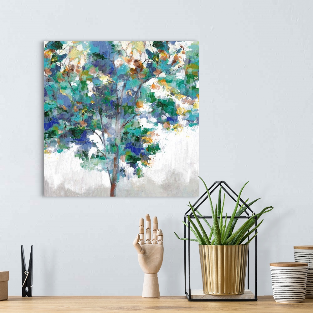 A bohemian room featuring Contemporary artwork of a single tree with textured leaves in colors of green, blue and yellow.