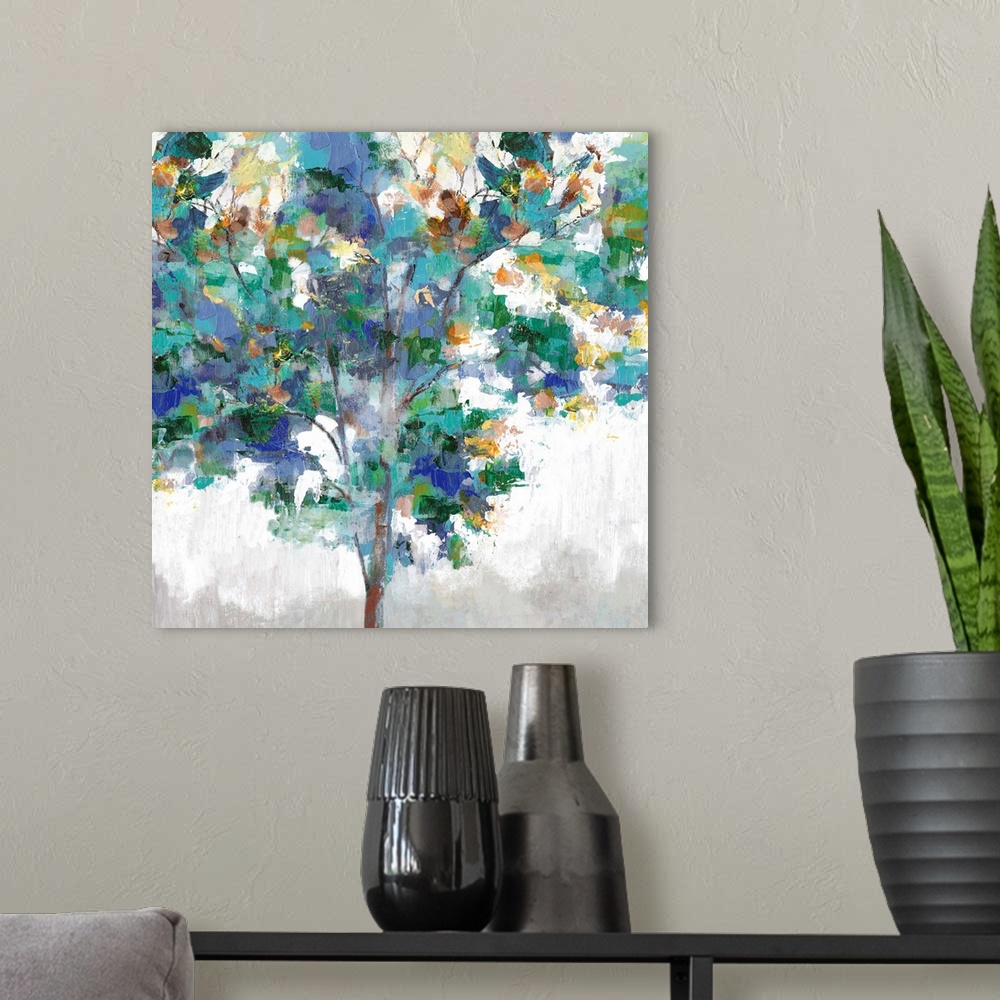 A modern room featuring Contemporary artwork of a single tree with textured leaves in colors of green, blue and yellow.