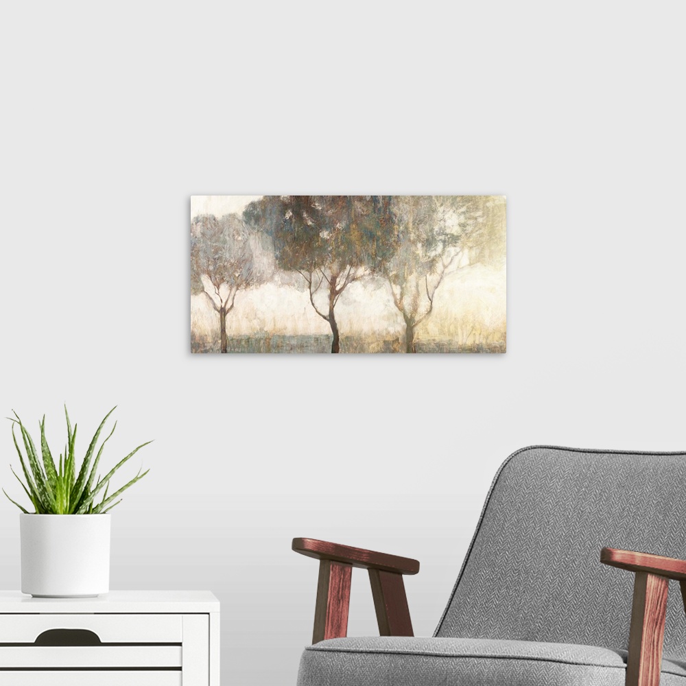 A modern room featuring Contemporary artwork of trees on a misty morning.