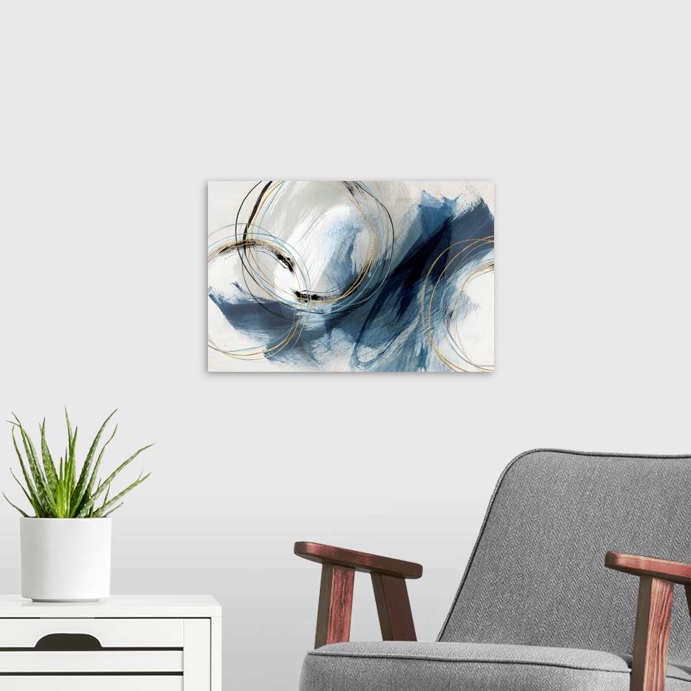 A modern room featuring Abstract painting with large blue brushstrokes and circular lines accented with gold.