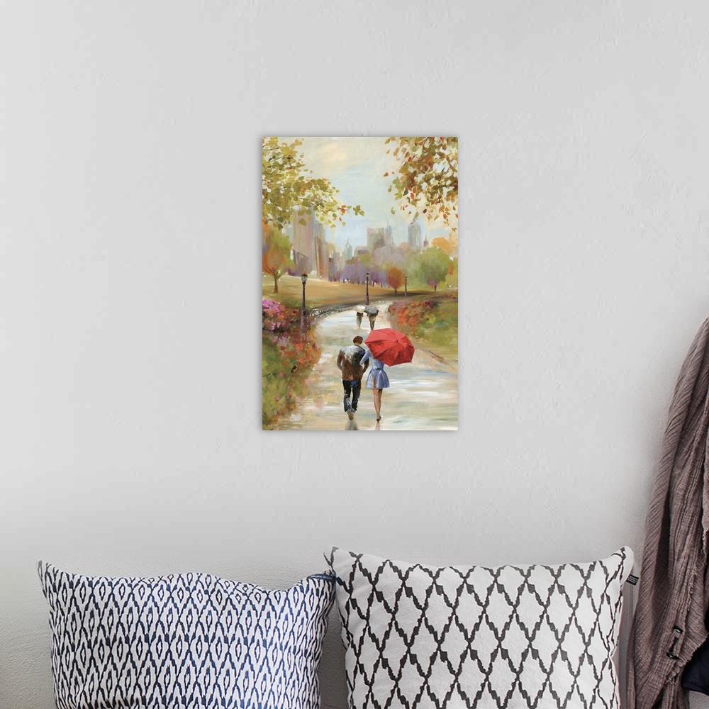 A bohemian room featuring A vertical painting of a park scene of couples walking along a path.