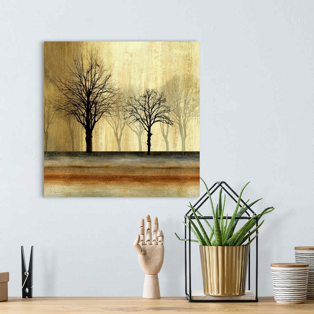 A bohemian room featuring Contemporary home decor artwork of silhouetted trees against a faded background.