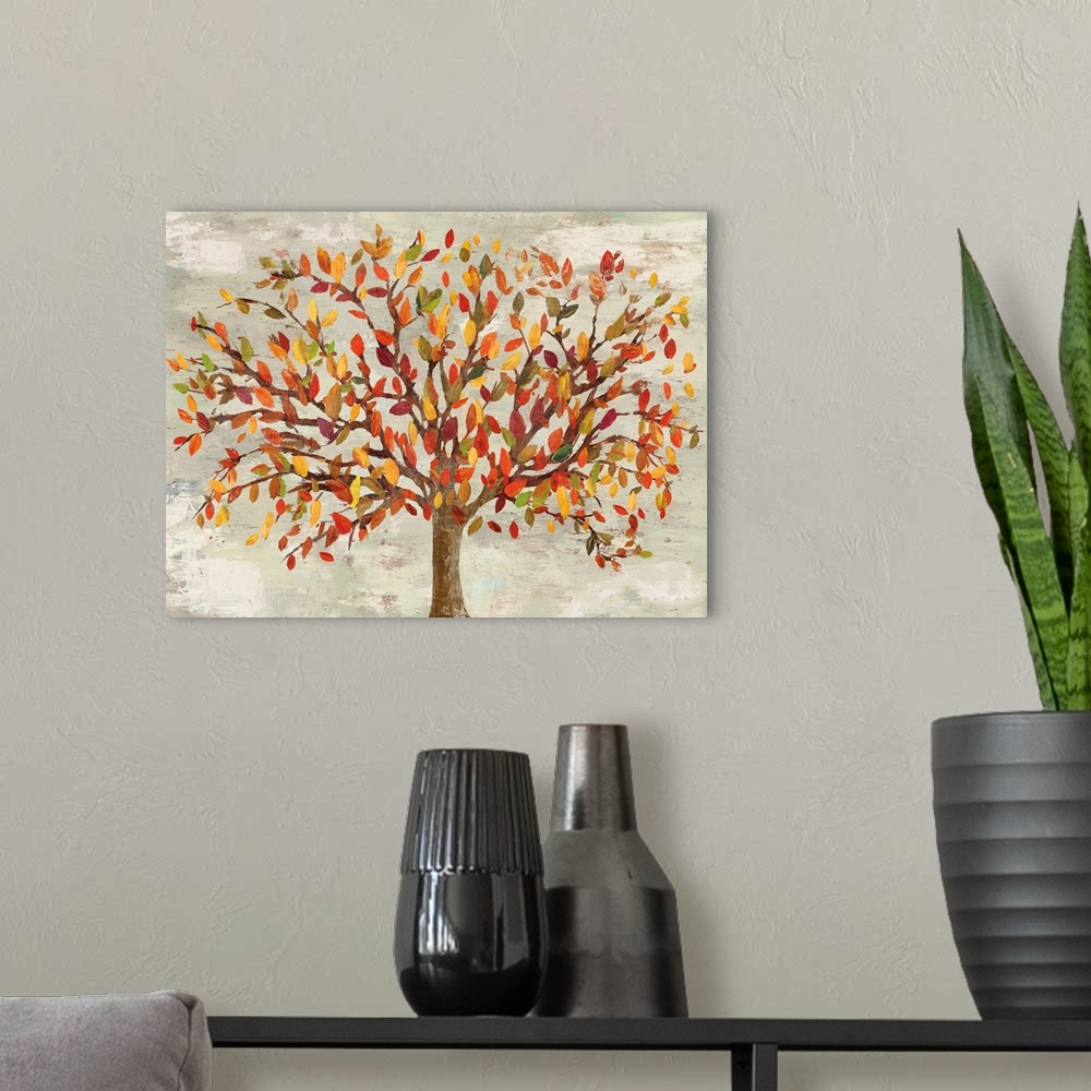 A modern room featuring Artwork of a tree with leaves in autumn colors.