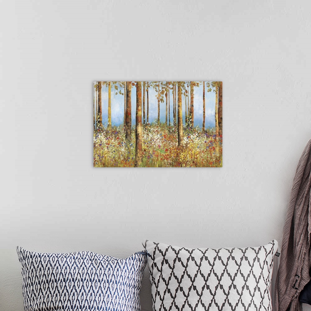 A bohemian room featuring Contemporary home decor artwork of a forest with a field of flowers.