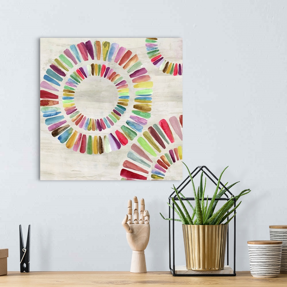 A bohemian room featuring Colorful rainbow paint strokes in rings.