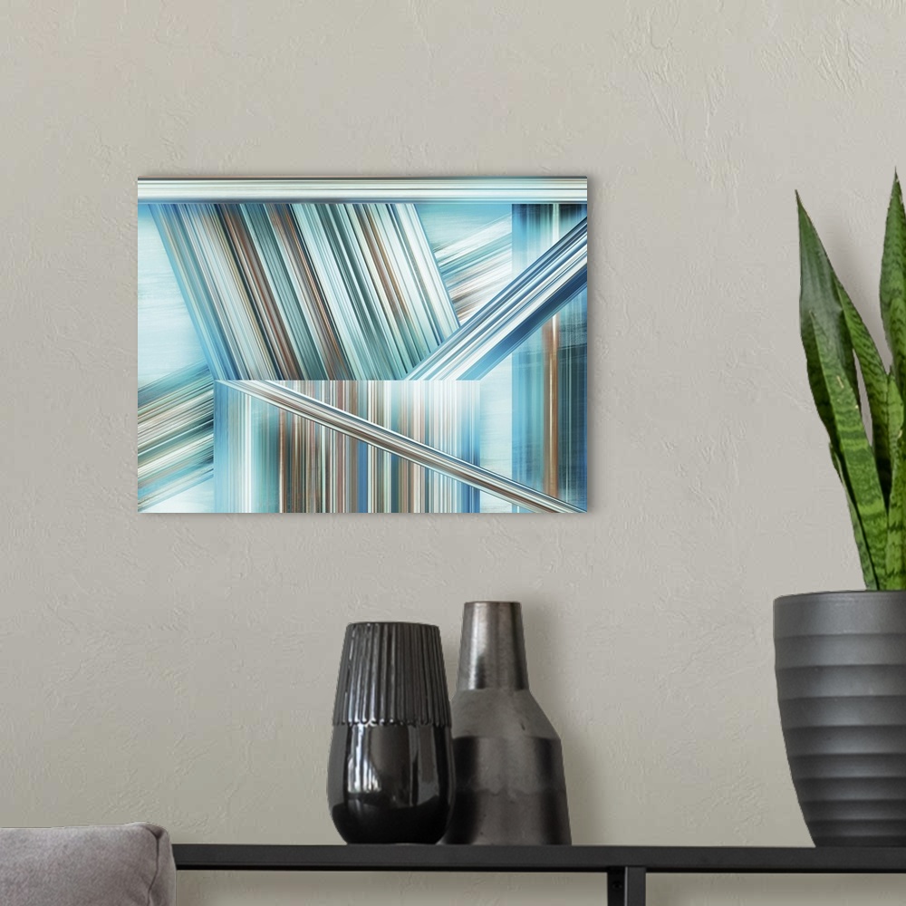 A modern room featuring Large vertical abstract of blue and brown lines in varies directions.