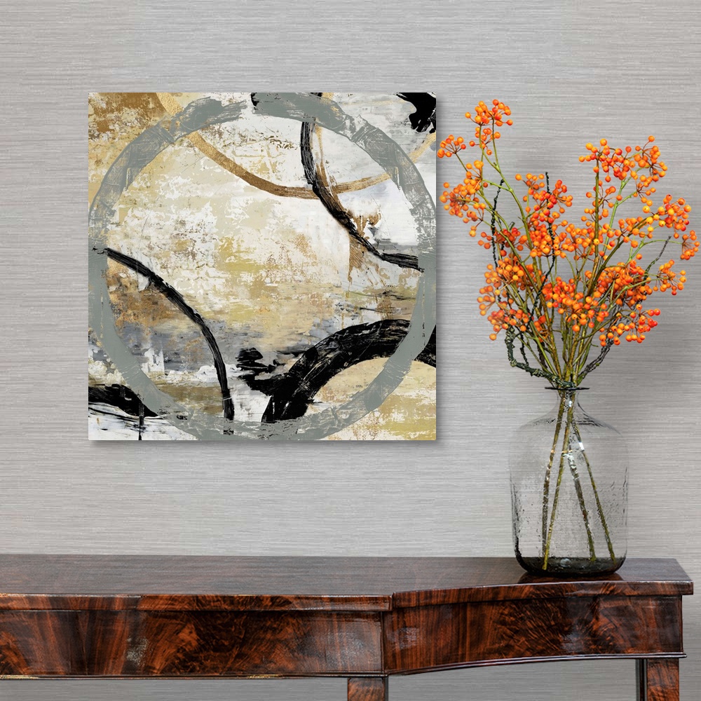 A traditional room featuring Abstract artwork of overlapping rings in shades of grey, black, and gold.