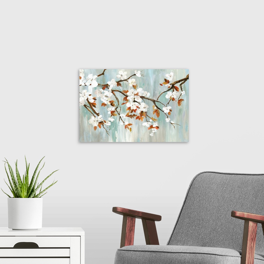 A modern room featuring A painting of a branch of white cherry blossoms against a gray and teal backdrop.
