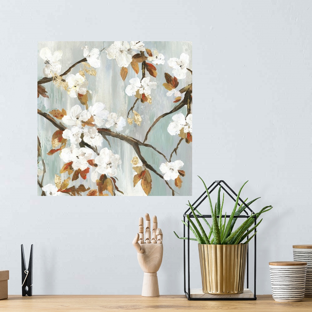 A bohemian room featuring A contemporary painting of white flower blooms on leaf covered branches against a neutral texture...