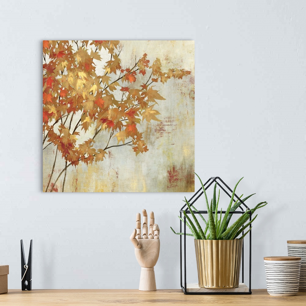 A bohemian room featuring Contemporary home decor artwork of golden foliage against a neutral background.