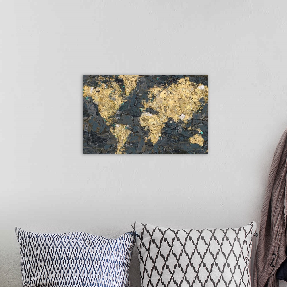 A bohemian room featuring A textured abstract painting of the world map in gray and gold colors.