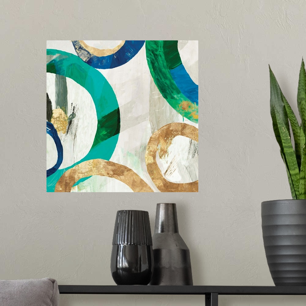 A modern room featuring Square abstract decor with rings in different sizes all around in blue, green, and gold hues on a...