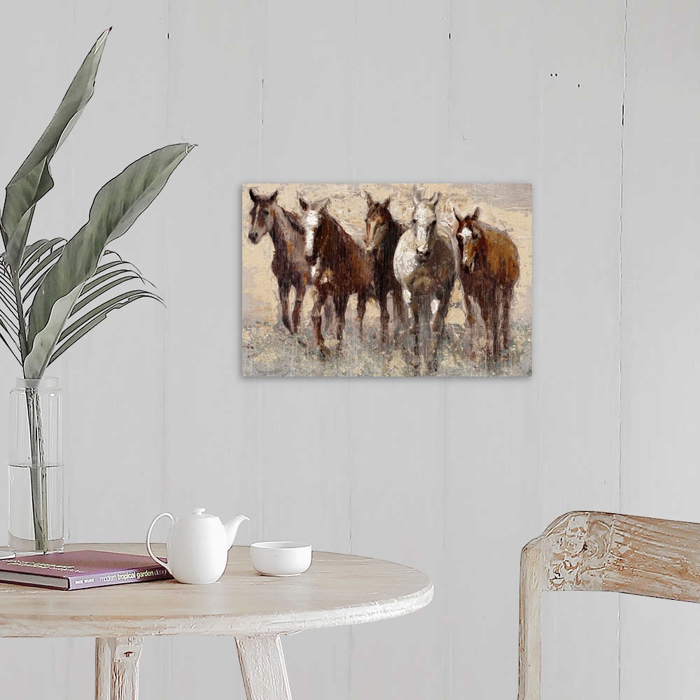 A farmhouse room featuring Contemporary painting of a band of brown horses in a field.
