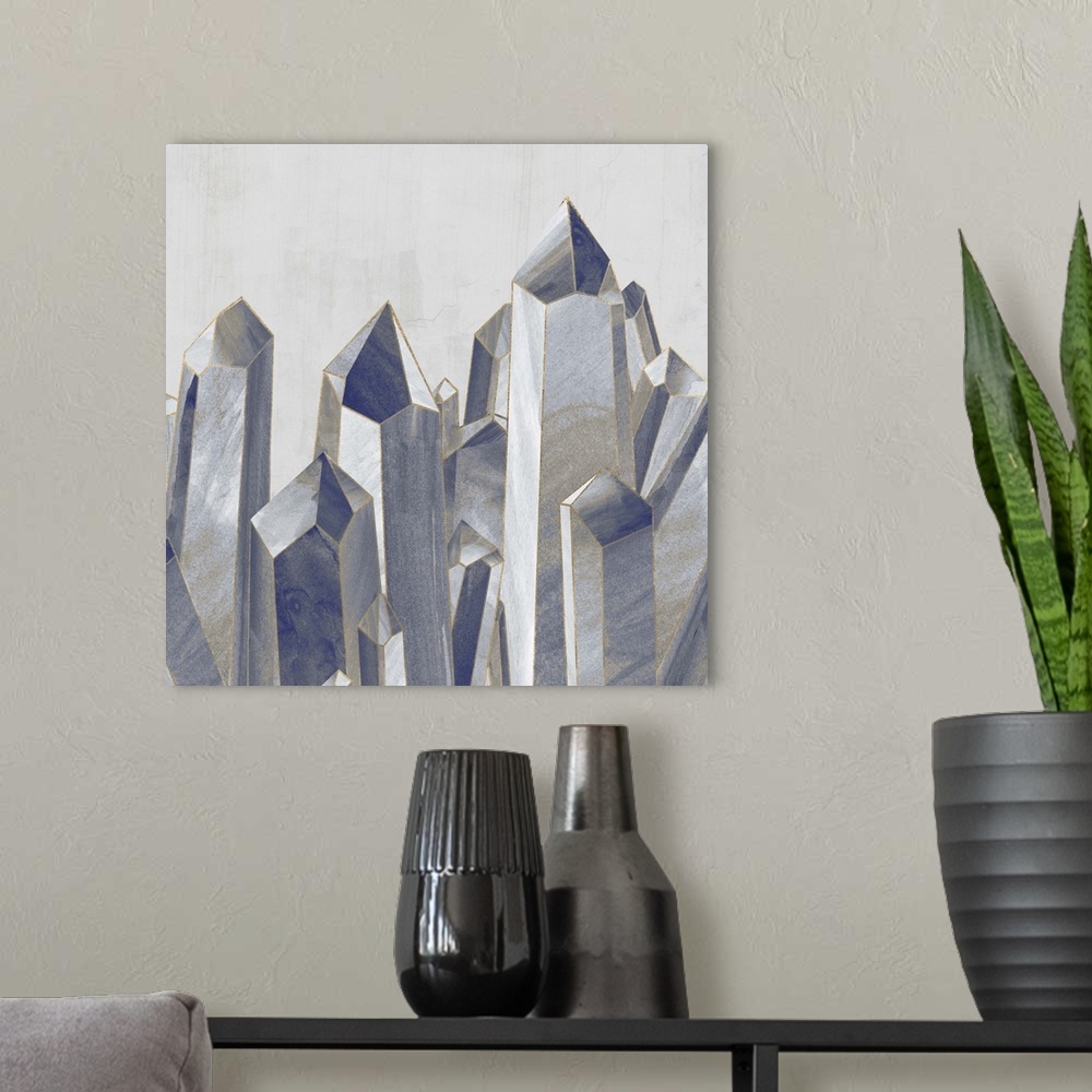A modern room featuring Decorative wall art with long crystal shapes compacted together in shades of blue with metallic g...