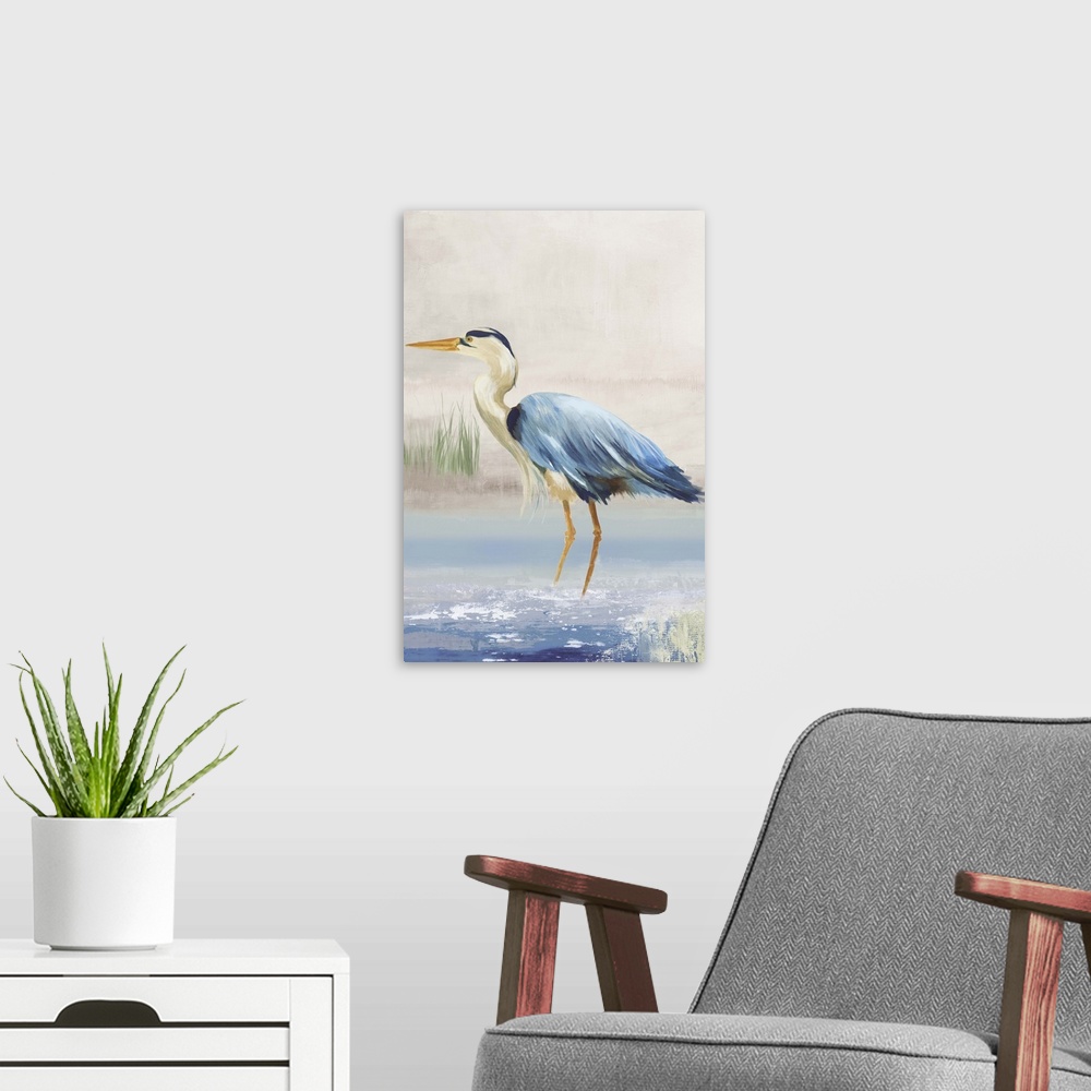 A modern room featuring Contemporary artwork of a great blue heron standing in shallow water.