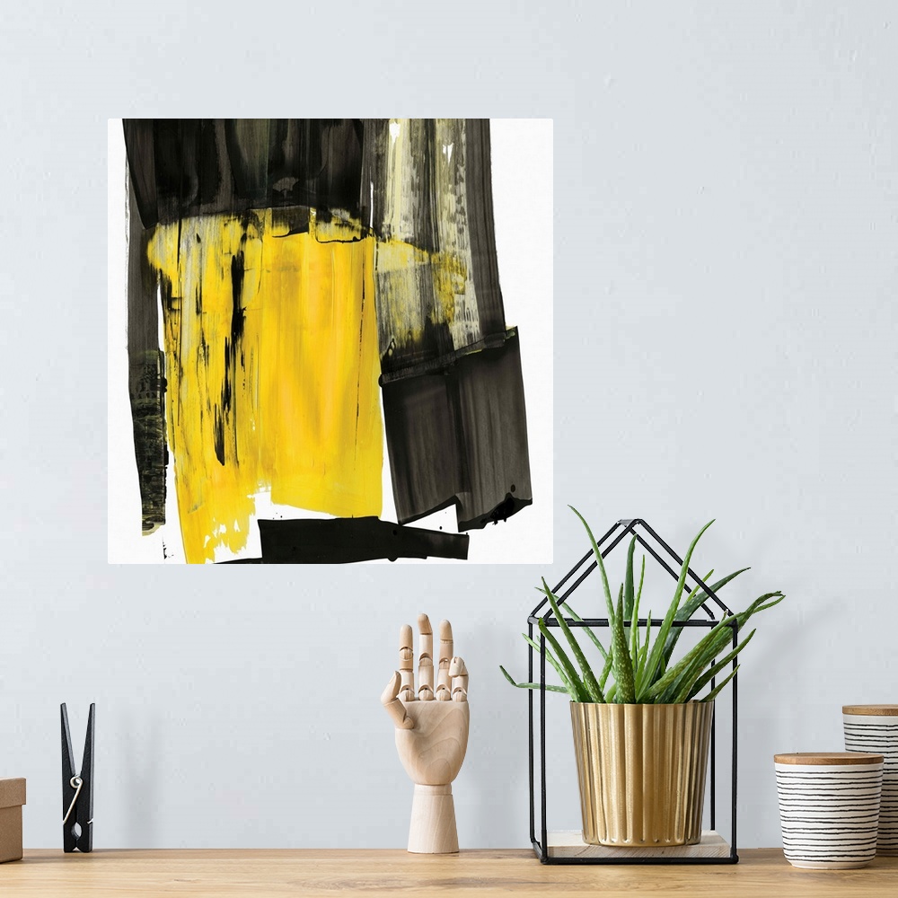 A bohemian room featuring Contemporary abstract artwork in black and grey with a pop of bright yellow.