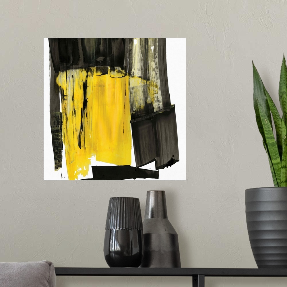 A modern room featuring Contemporary abstract artwork in black and grey with a pop of bright yellow.