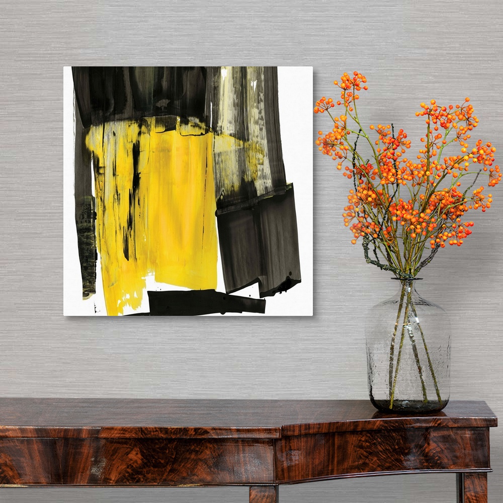 A traditional room featuring Contemporary abstract artwork in black and grey with a pop of bright yellow.