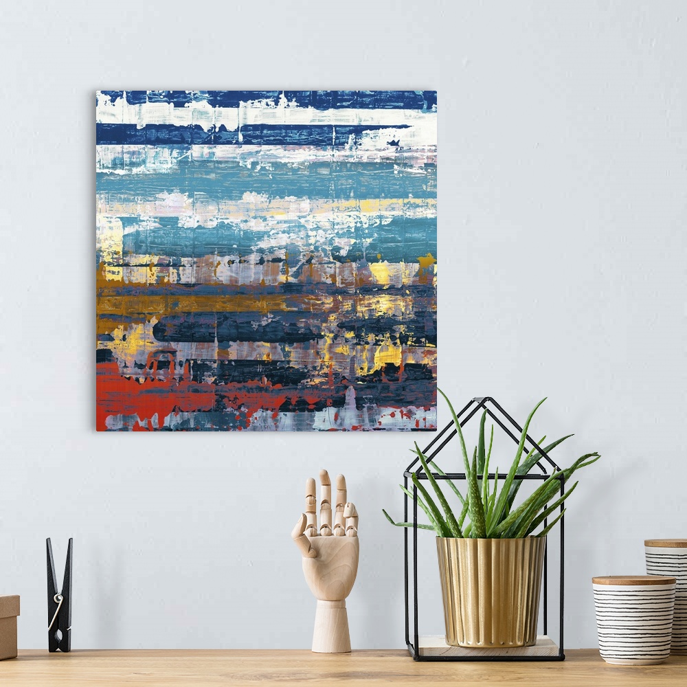 A bohemian room featuring Contemporary abstract home decor artwork using blues and reds in distressed conditions.