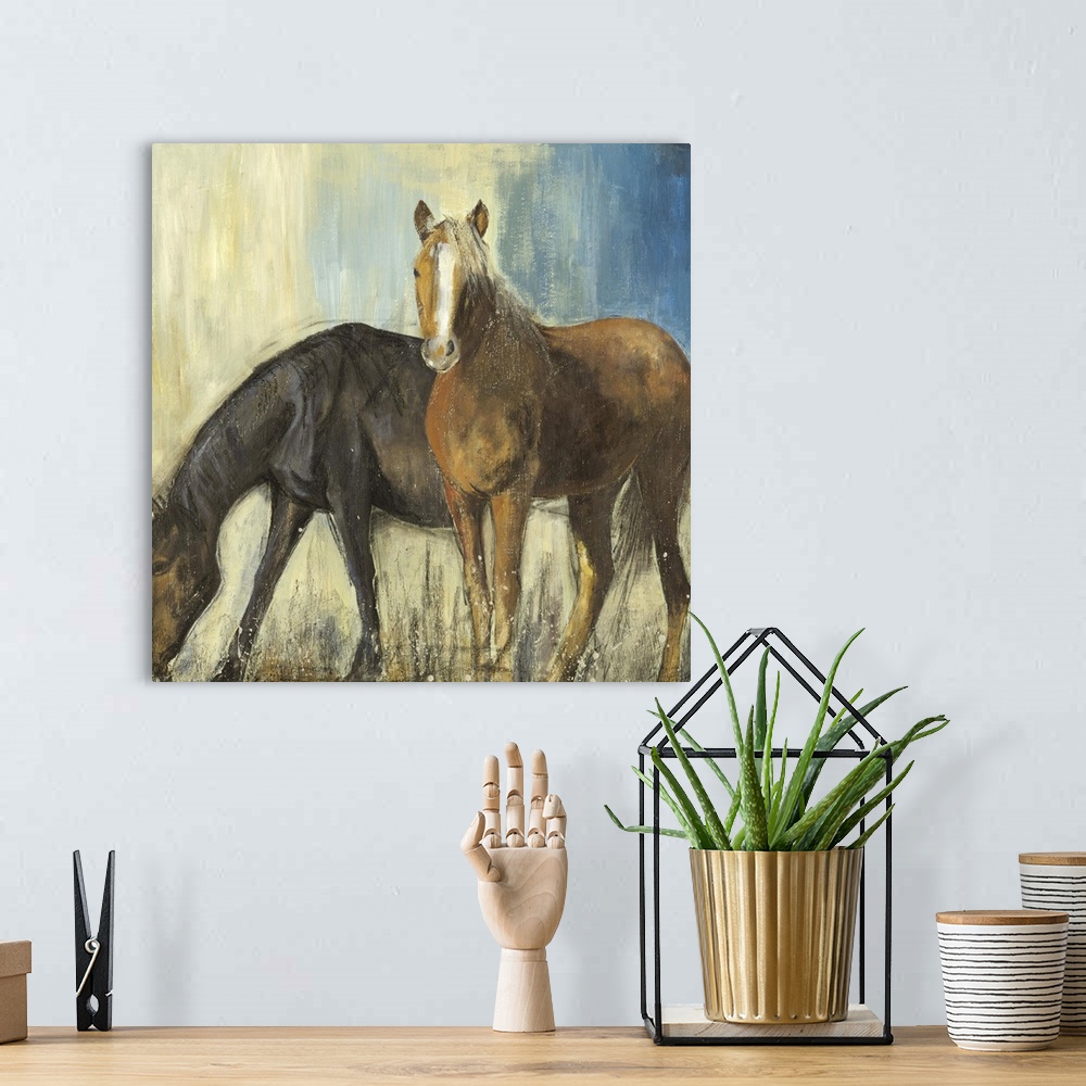 A bohemian room featuring Contemporary home decor artwork of two brown horses standing against an abstract background.