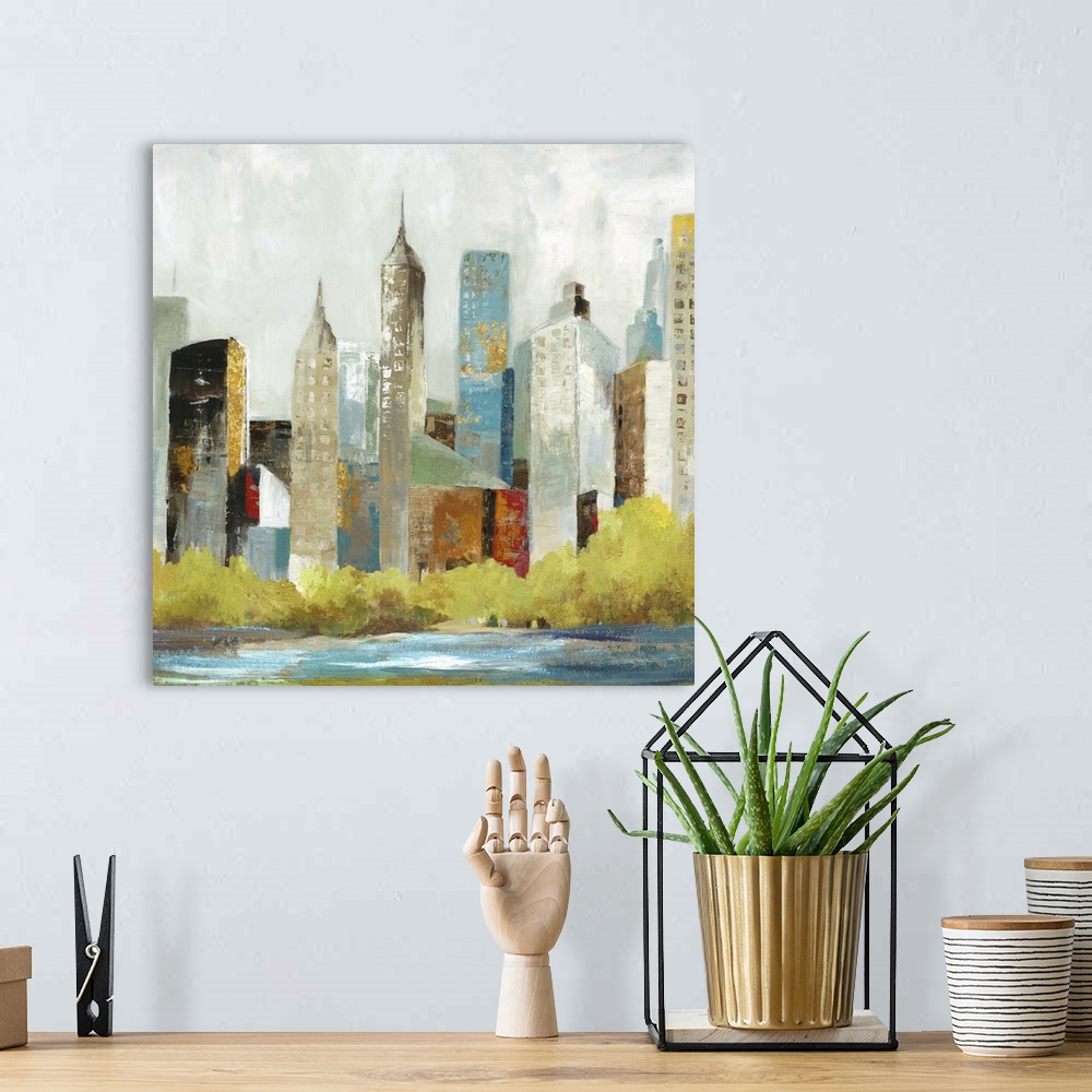 A bohemian room featuring Contemporary home decor artwork of city skyline in muted tones.