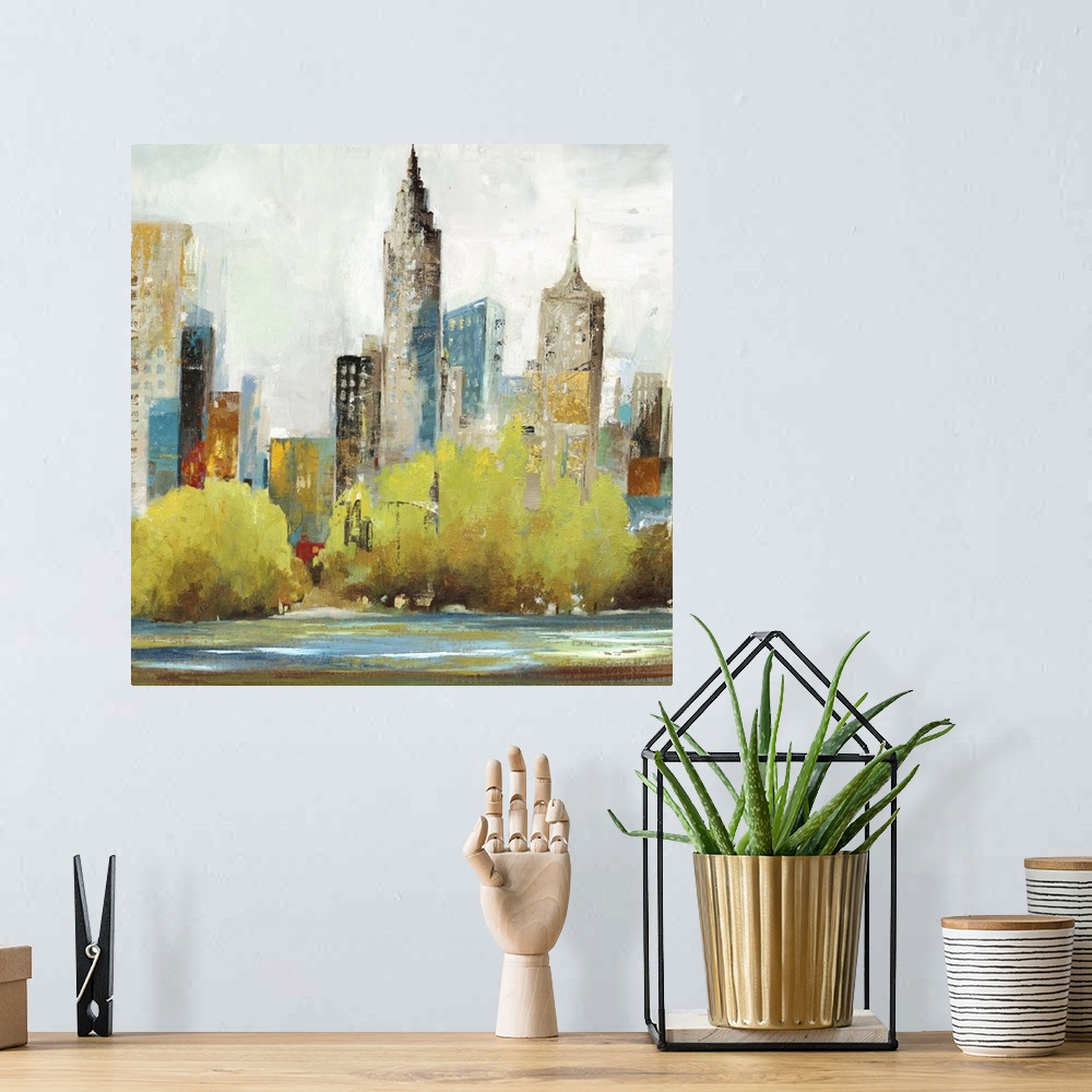 A bohemian room featuring Contemporary home decor artwork of city skyline in muted tones.
