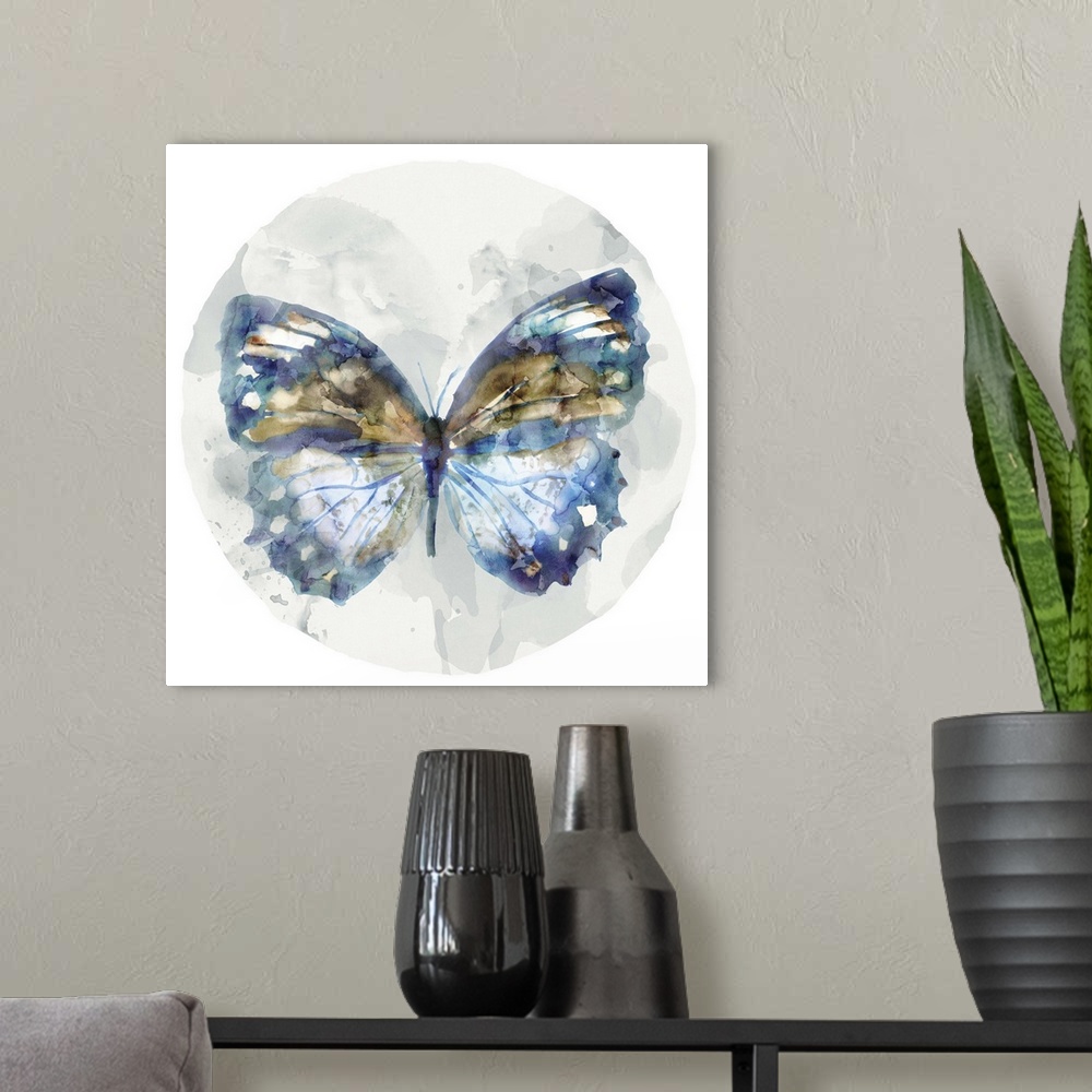 A modern room featuring Watercolor artwork of a butterfly with broad blue and copper colored wings on a grey circular des...