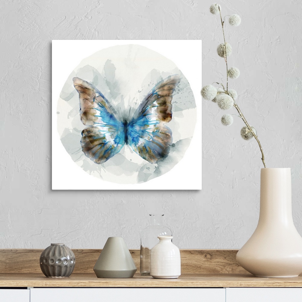 A farmhouse room featuring Watercolor artwork of a butterfly with broad blue and copper colored wings on a grey circular des...