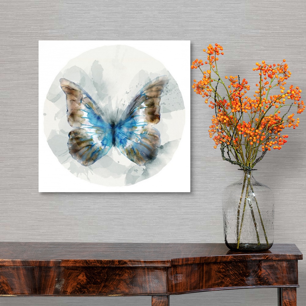 A traditional room featuring Watercolor artwork of a butterfly with broad blue and copper colored wings on a grey circular des...