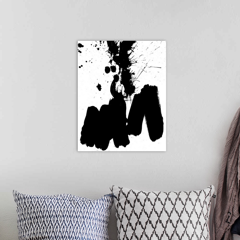 A bohemian room featuring Contemporary abstract home decor artwork using black paint splashes against a white background.