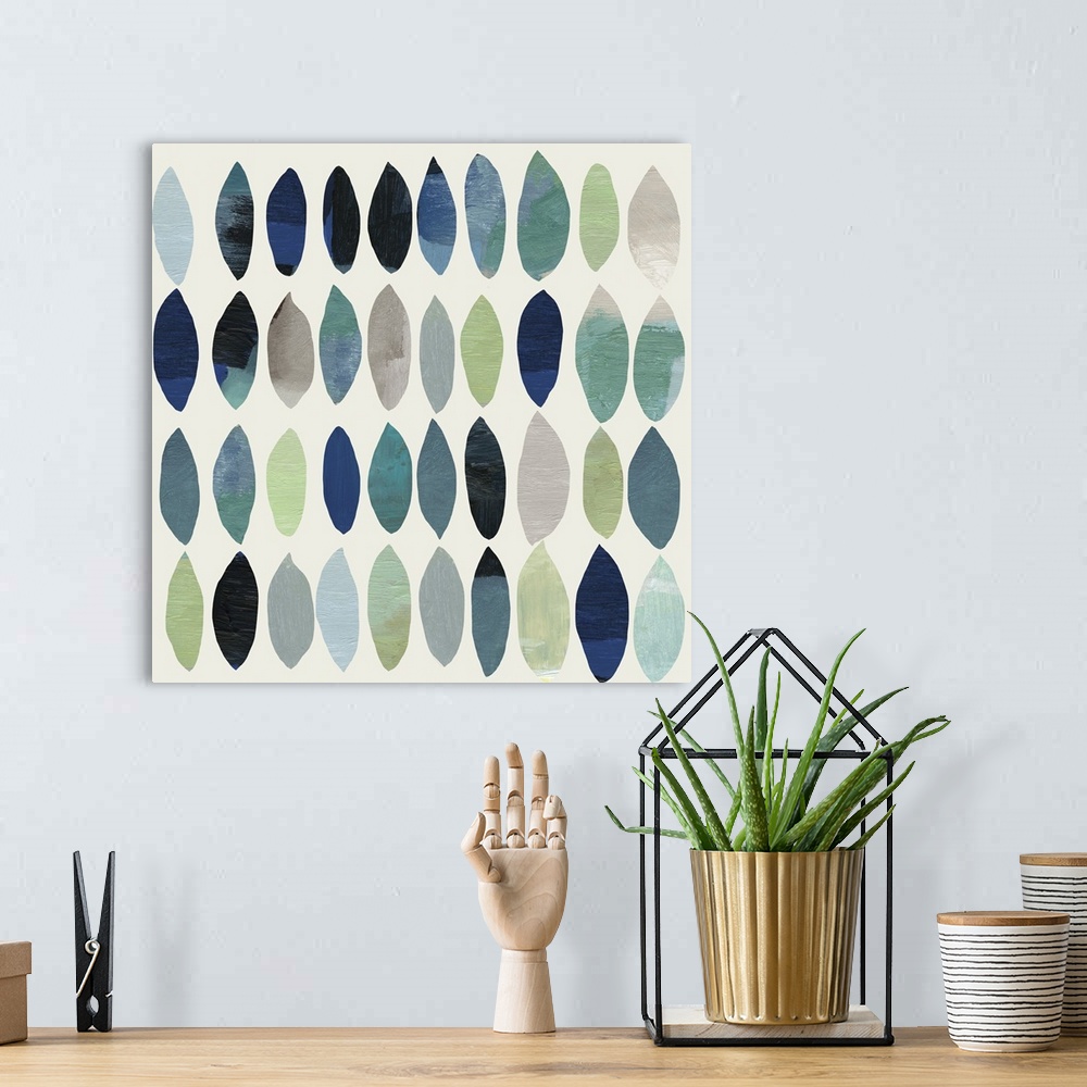 A bohemian room featuring Abstract painting of leafs in shades of blue and green.