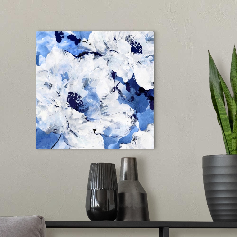 A modern room featuring Square contemporary painting of white flowers on a blue background in textured paint.