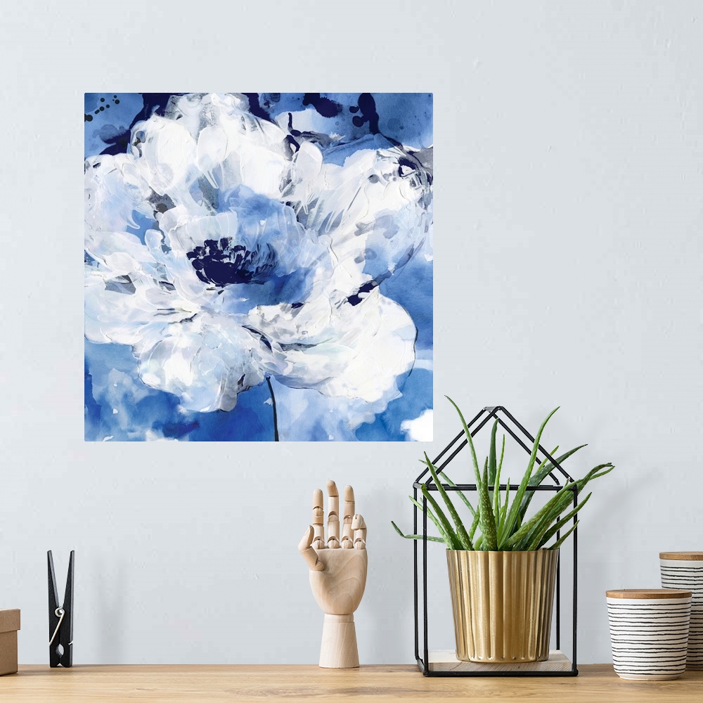 A bohemian room featuring Square contemporary painting of white flowers on a blue background in textured paint.
