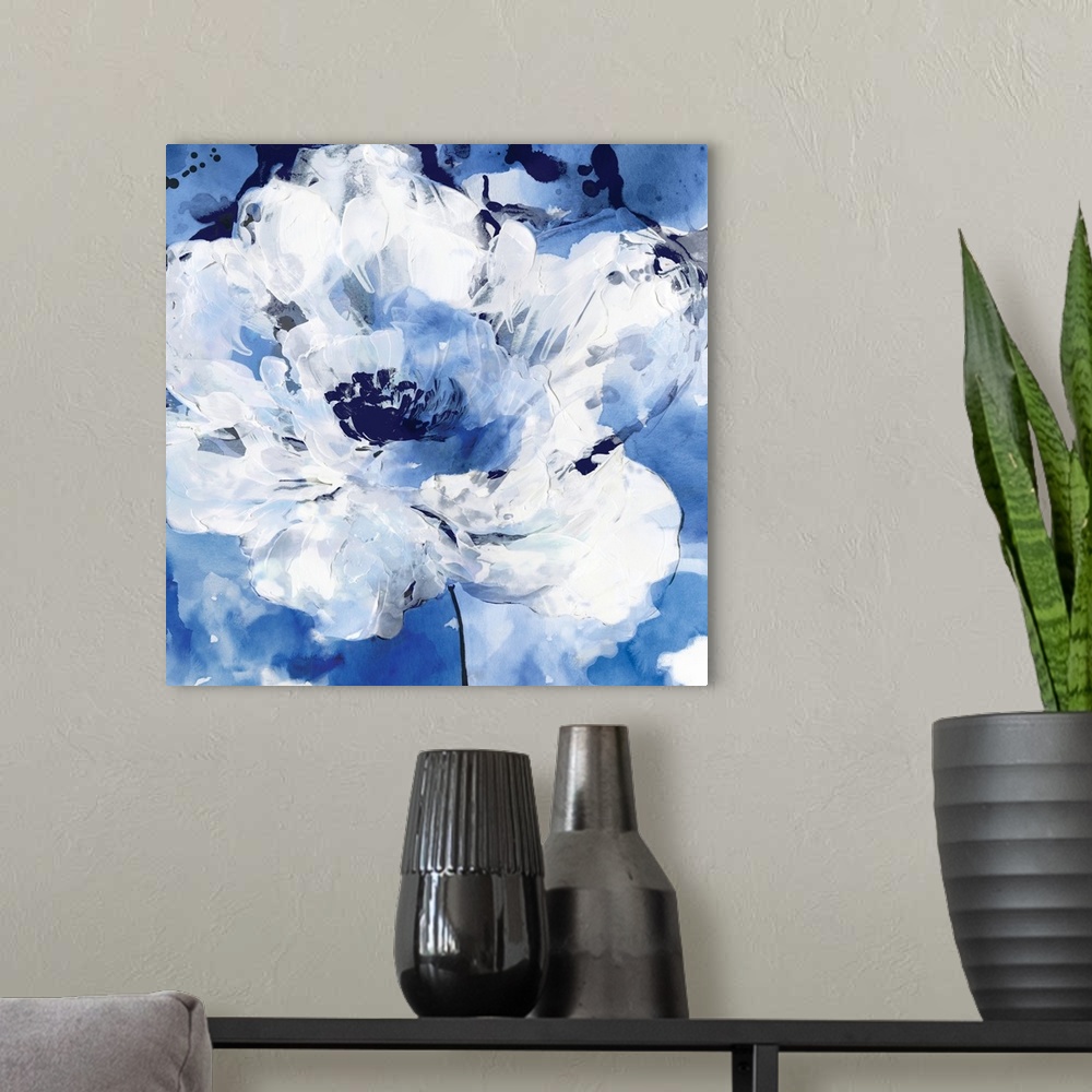 A modern room featuring Square contemporary painting of white flowers on a blue background in textured paint.
