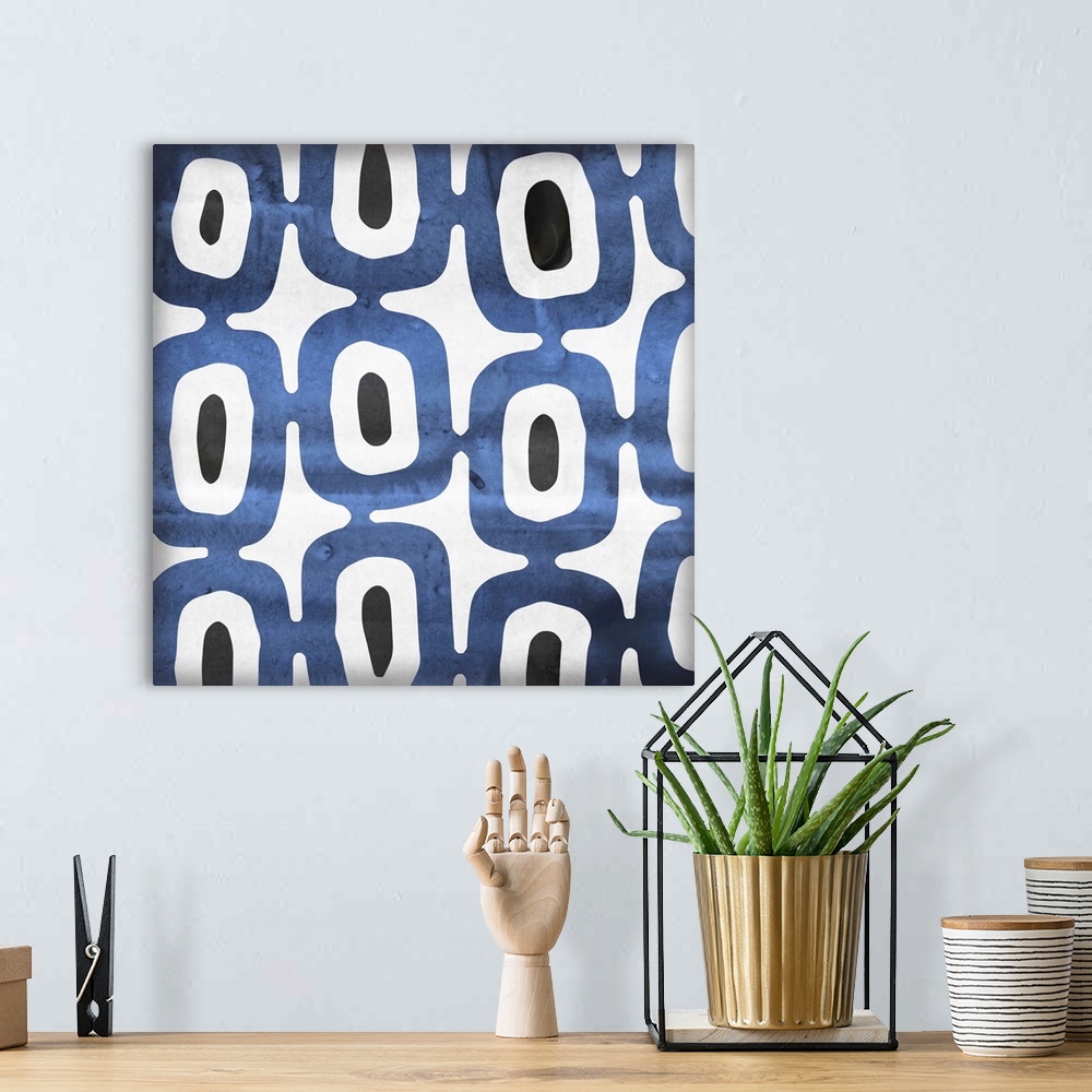 A bohemian room featuring Contemporary home decor art of a blue and white abstract pattern.