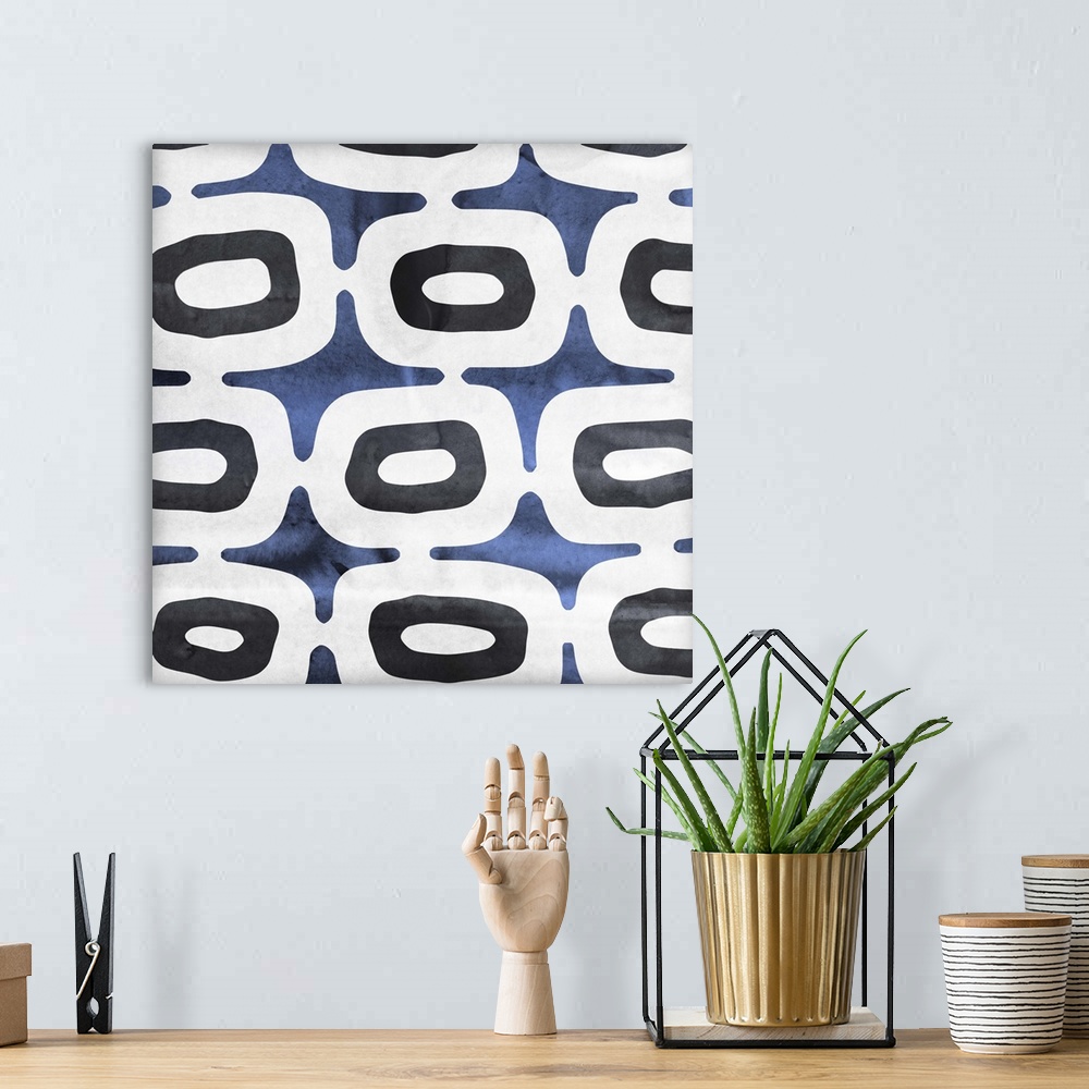 A bohemian room featuring Contemporary home decor art of a blue and white abstract pattern.
