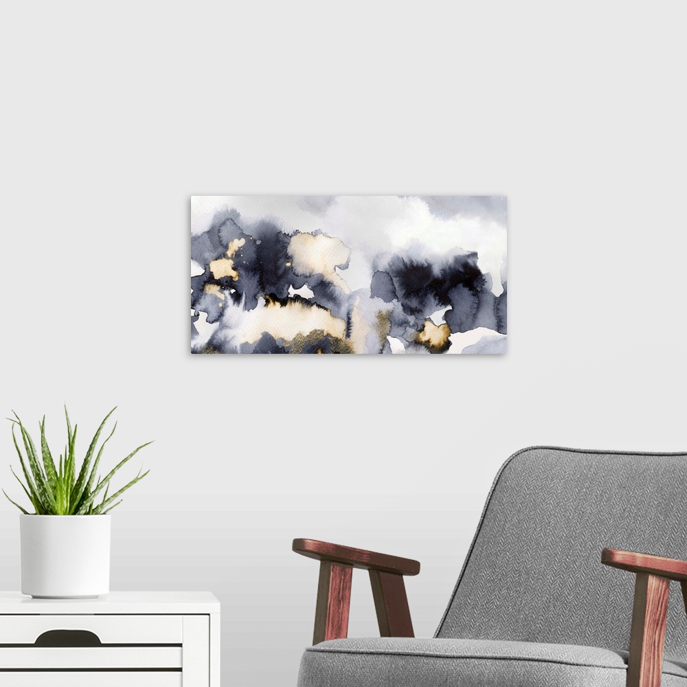 A modern room featuring Abstract artwork with different shades of gray and gold.